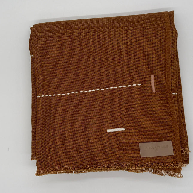 Taka Embroidered Linen Throw in Cinnamon