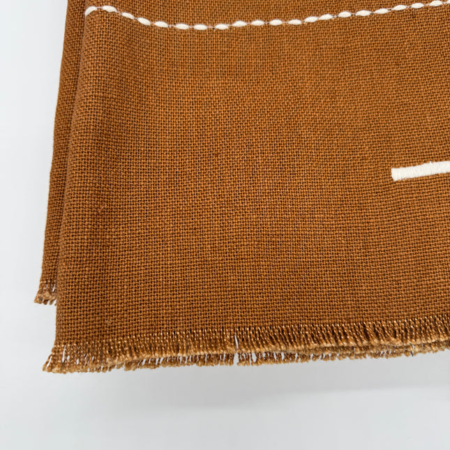 Taka Embroidered Linen Throw in Cinnamon