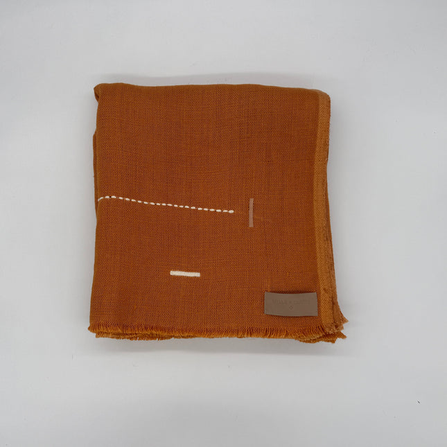 Taka Embroidered Linen Throw in Sienna