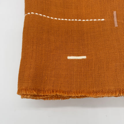 Taka Embroidered Linen Throw in Sienna