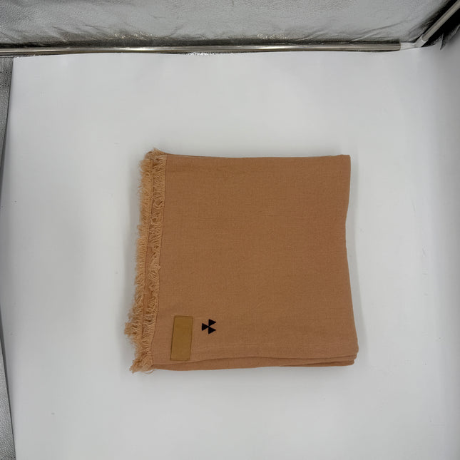 Taka Embroidered Linen Throw in Rose Madder